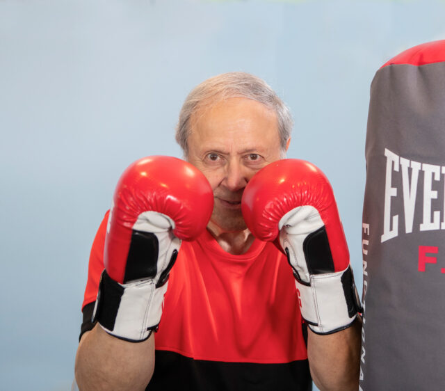 A retired independent Living Boxer exercises at the newly renovated fitness center in RiverWoods Manchester, Manchester NH