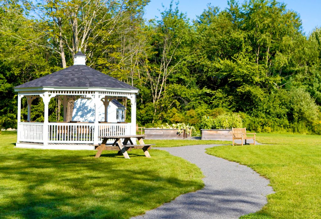 Picnic area and gazebo for outdoor activities at RiverWoods Exeter in Exeter, New Hampshire.