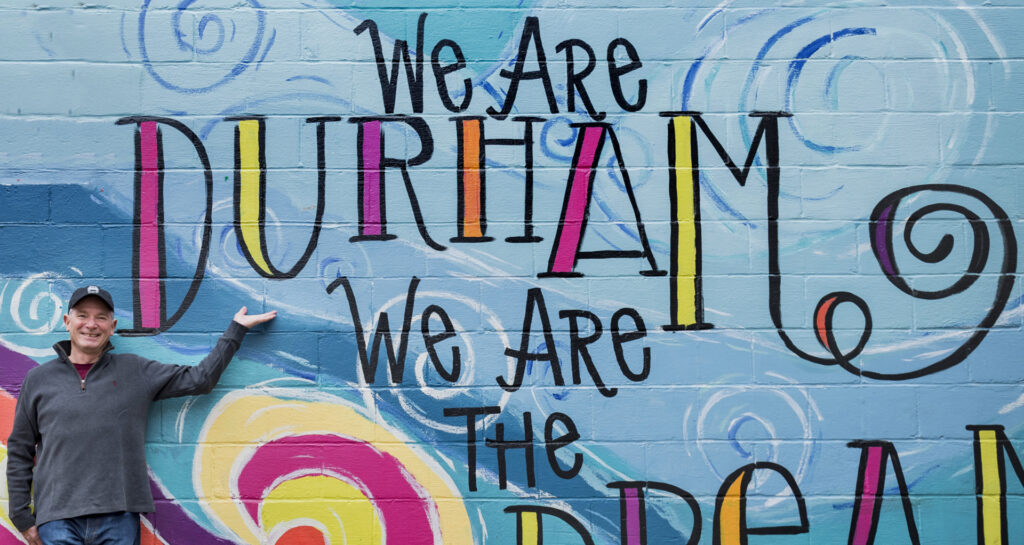 RiverWoods Durham Independent Living resident with mural in Durham, New Hampshire